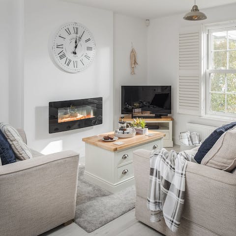 Warm up by the electric fireplace