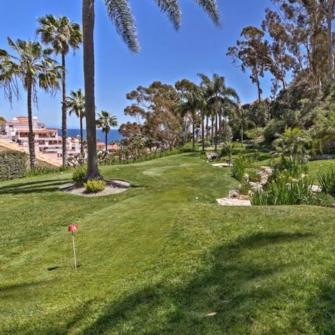 Head over to the 18-hole putting green