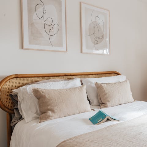 Snuggle up in the comfortable bed with a book bought at one of the city's many bookshops