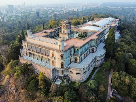 Tour Chapultepec Castle, a hilltop palace overlooking Mexico City, roughly a fifteen-minute drive
