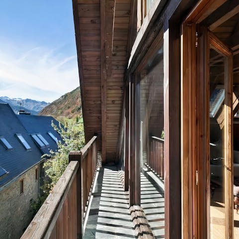 Spot the snow-tipped mountains from the slender top-floor balcony
