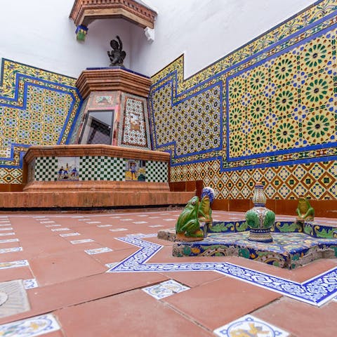 Relax on the terrace with its ornate Andalusian tiles