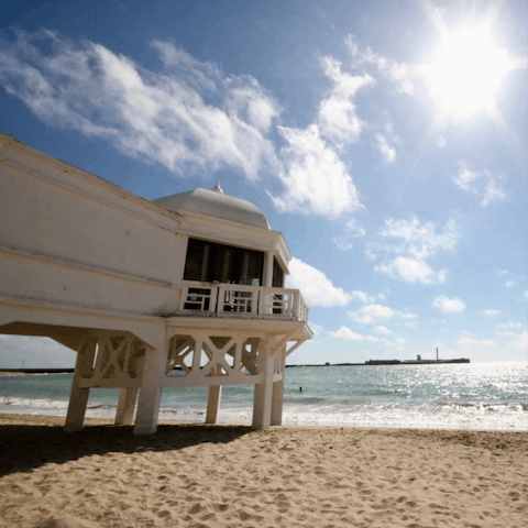 While away the afternoon on the soft sands of La Caleta, a short walk from home