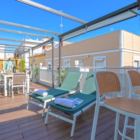 Sip your morning coffee on one of the perfectly placed sun loungers