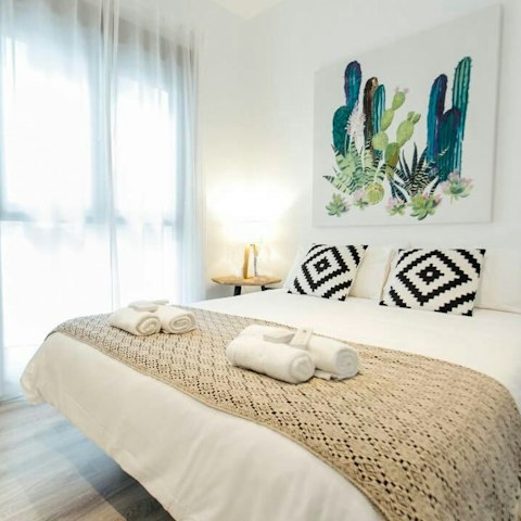 Wake up from a restful night's sleep in your minimal bedroom