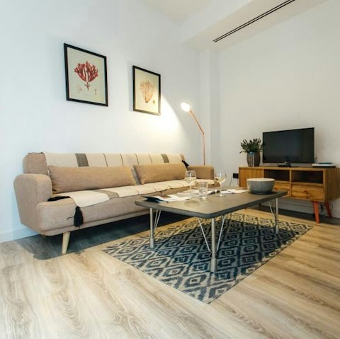Sink into the plump sofa to enjoy a movie or an evening with your book