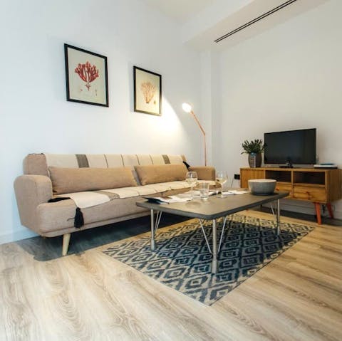 Sink into the plump sofa to enjoy a movie or an evening with your book