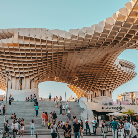 Visit the iconic Setas de Sevilla, a short walk away