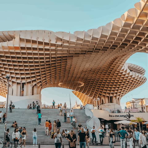 Visit the iconic Setas de Sevilla, a short walk away