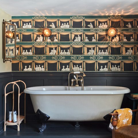Soak in the in-room roll-top bath after a day on the coast