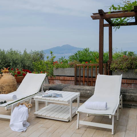 Unwind with views of Mount Vesuvius on the patio