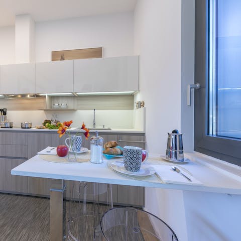 Start your morning with coffee and pastries at the bright breakfast bar