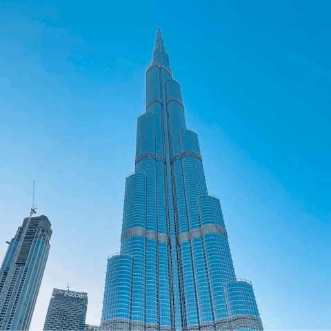 Make a stop at the mesmerising Burj Khalifa – just a twenty-minute train ride away
