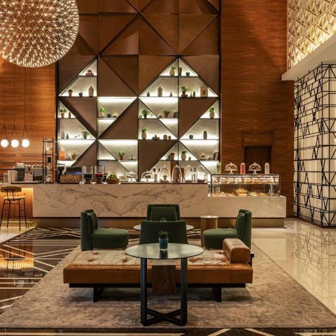 Enjoy a refreshing pause in the serene lobby café