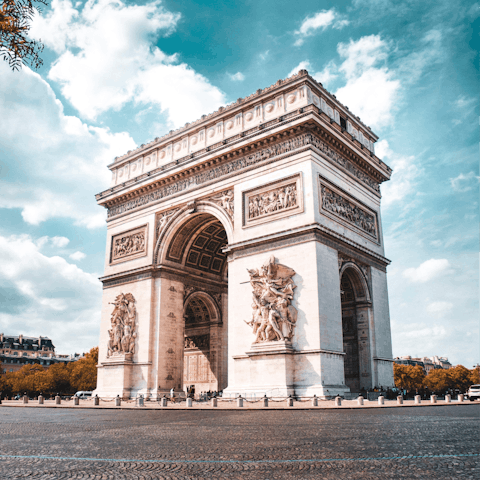 Pay a visit to the spectacular Arc de Triomphe, a twelve-minute walk away