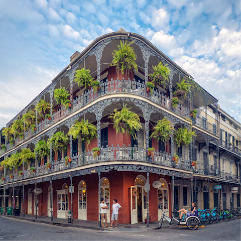 Gaze up at the colourful buildings and cast-iron balconies of the historic French Quarter, a stone's throw away