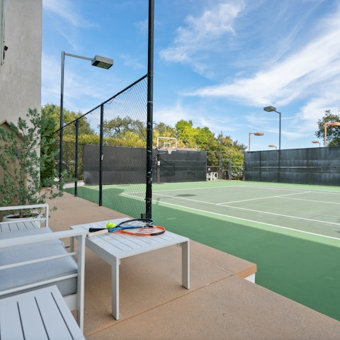 Challenge each other to a game of tennis