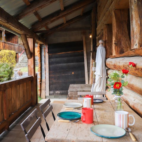 Eat outside on the private balcony