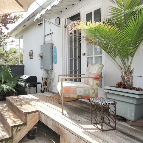 Lounge on the back porch while the barbecue heats up