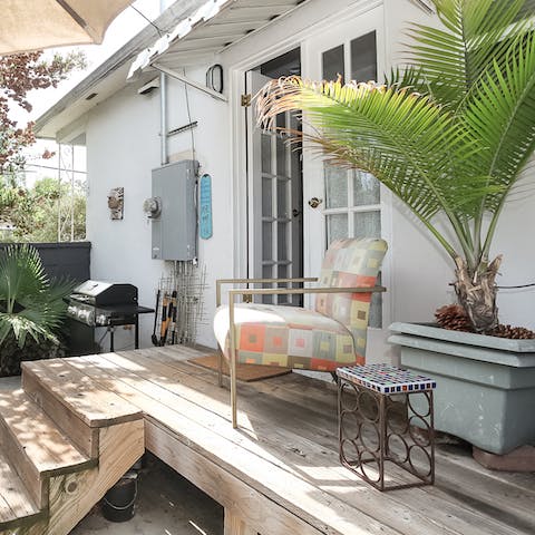 Lounge on the back porch while the barbecue heats up