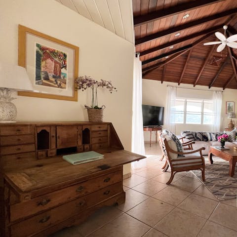 Admire the old-world touches like the antique writer's desk