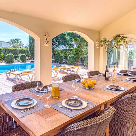 Pour yourself a glass of Algarve wine and relax on the terrace as the evening fades