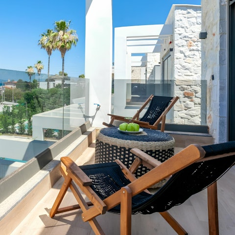 Admire sea views from the private balcony