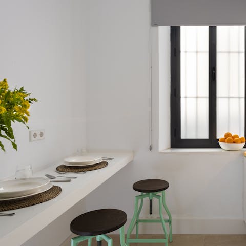 Enjoy a home cooked meal for two in your light filled kitchen cum dining space