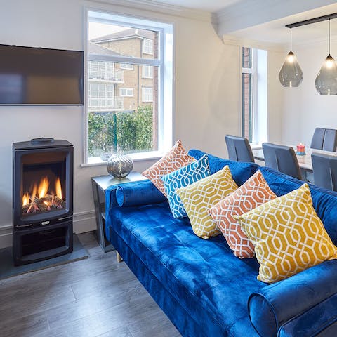 Come home from a coastal walk and warm up by the fire