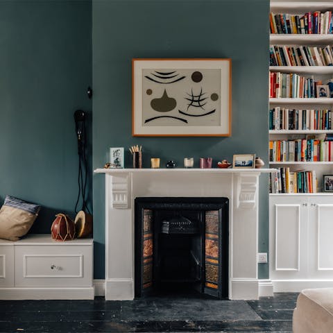 Curl up with a well-thumbed book from the host's collection