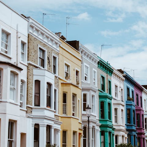 Visit Portobello Road and admire Notting Hill's colourful houses