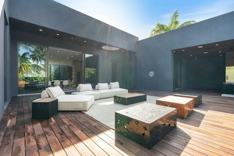Stretch out on the wide deck while a warm breeze drifts through the canopy