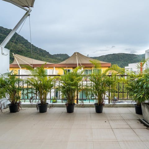 Retreat to the balcony and soak up the sensational mountain views beyond