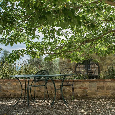 Enjoy alfresco meals under the olive trees
