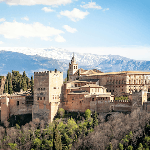 Begin your stay in Granada with a stroll to the majestic Alhambra