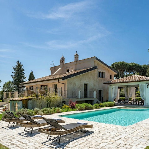 Enjoy long days soaking up the sunshine by the pool