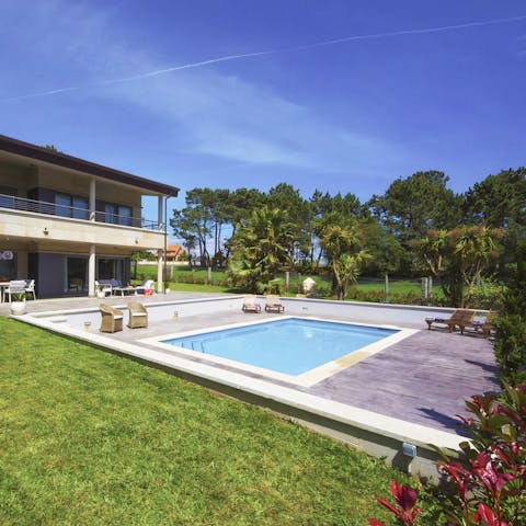 Laze on sun loungers before cooling off with a dip in your private pool