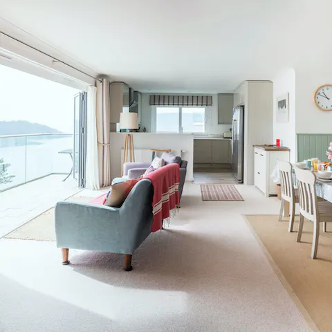 Open the bi-fold doors and feel the sea breeze on your skin