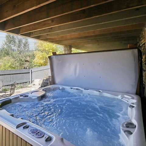 Relax and enjoy peace while soaking in the hot tub