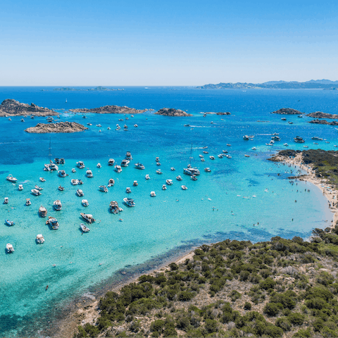 Soak up the sun on the soft sands of Cala Brandinchi beach – it's a short drive away