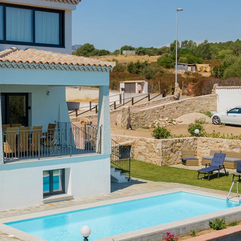 Watch the kids splash about in the private pool from the shade of the terrace