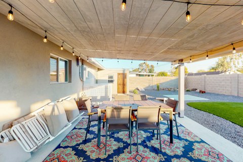 Dine alfresco under string lights on warm desert evenings