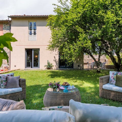 Make Aperol Spritzes on the lawn part of the new routine