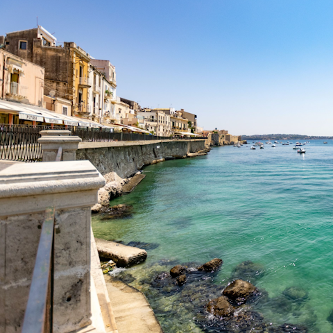Stay in historic Ortigia, within a short stroll of the Temple of Apollo