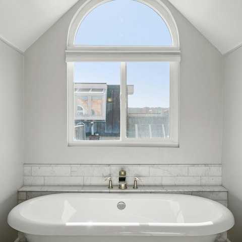 Treat yourself to a long, hot soak in the freestanding tub