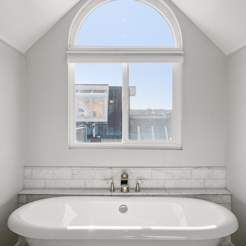 Treat yourself to a long, hot soak in the freestanding tub