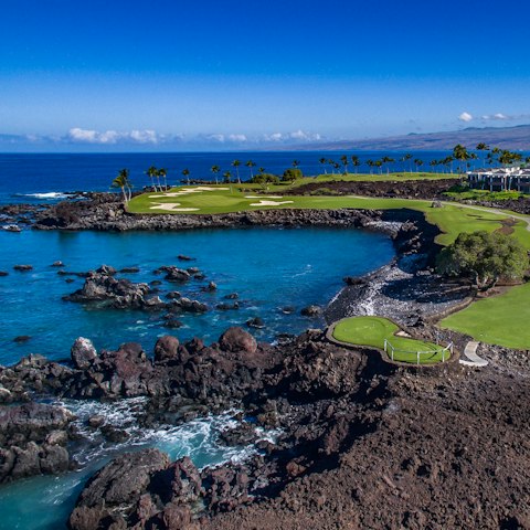 Swim in the sea at Mauna Lani Beach – it's a two-minute drive away