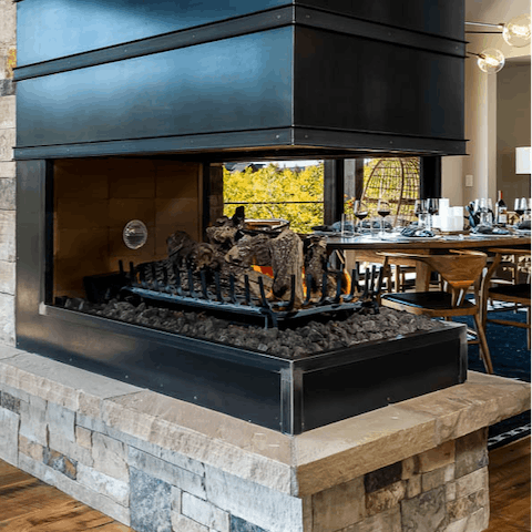 Warm cold hands at the fireplace