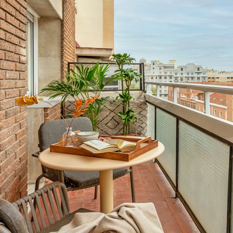 Watch the sun go down on the private balcony, a glass of Cava in hand