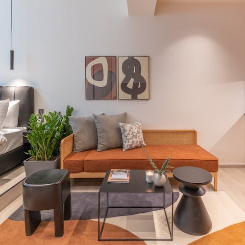 kick back on the stylish sofa with a glass of wine after a day of exploring the city
